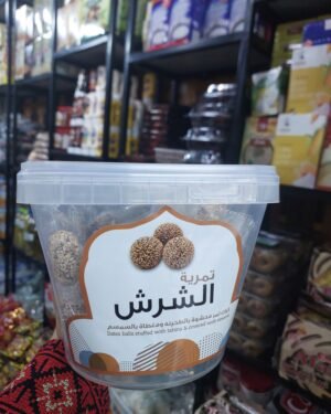Al Sheresh : Date balls stuffed with tahini and Coated with Sesame     الشرش: كرات تمر محشوة بالطحينة ومغطاة بالسمسم - Covered with Sesame مغطاة بالسمسم