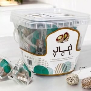 V A L: Date balls stuffed with tahini 
 فال: كرات تمر محشوة بالطحينة