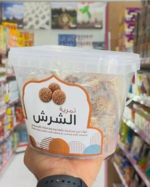 Al Sheresh : Date balls stuffed with tahini and Coated with Sesame     الشرش: كرات تمر محشوة بالطحينة ومغطاة بالسمسم